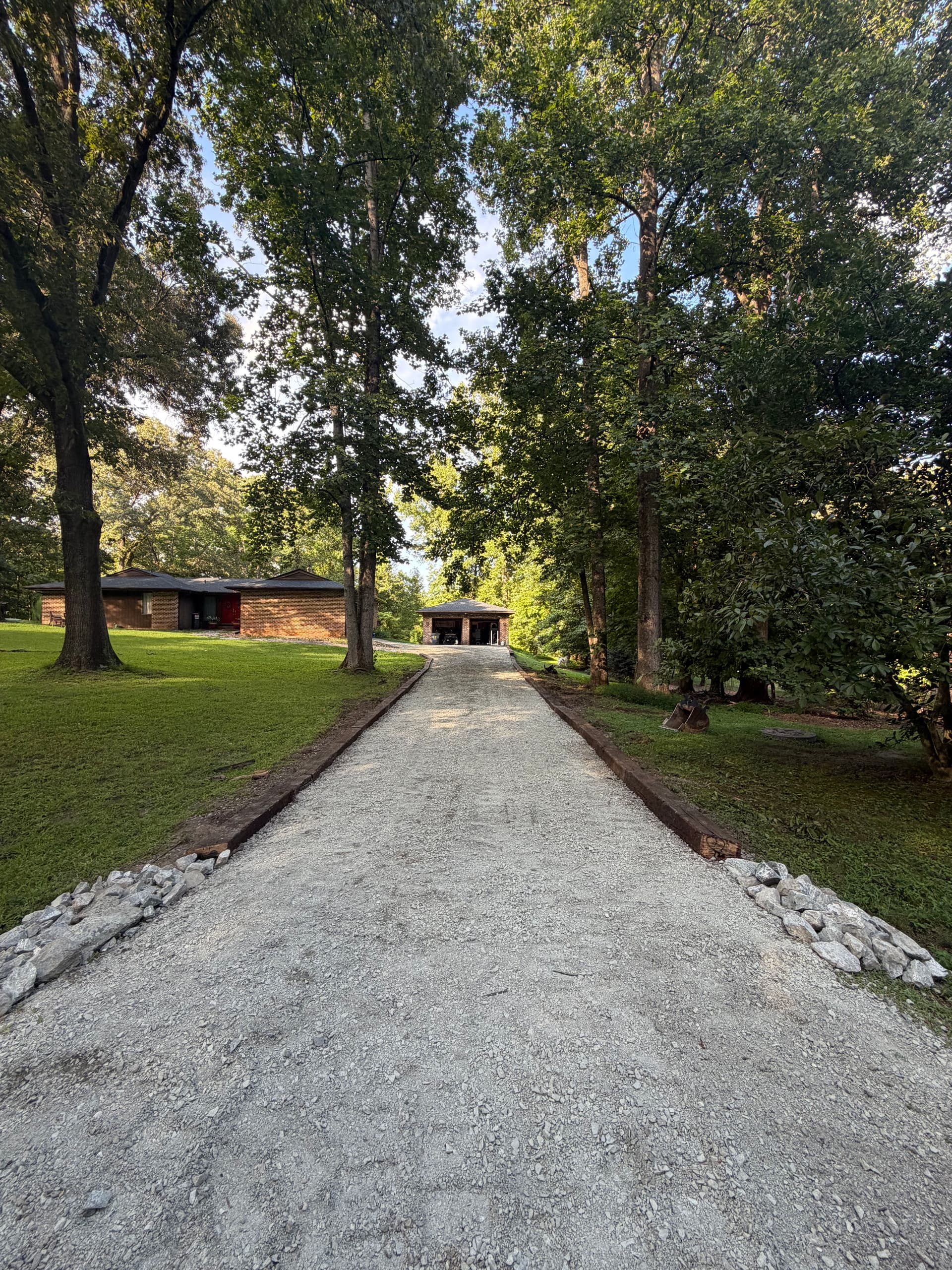 Gravel Driveway Gets New Edging and Fresh Top Dressing image